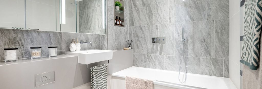 Property photo 3 of 3 Modern Designed Bathroom With Shower Over Bath, Wash Basin With Wall Mirror And Cabinet Space