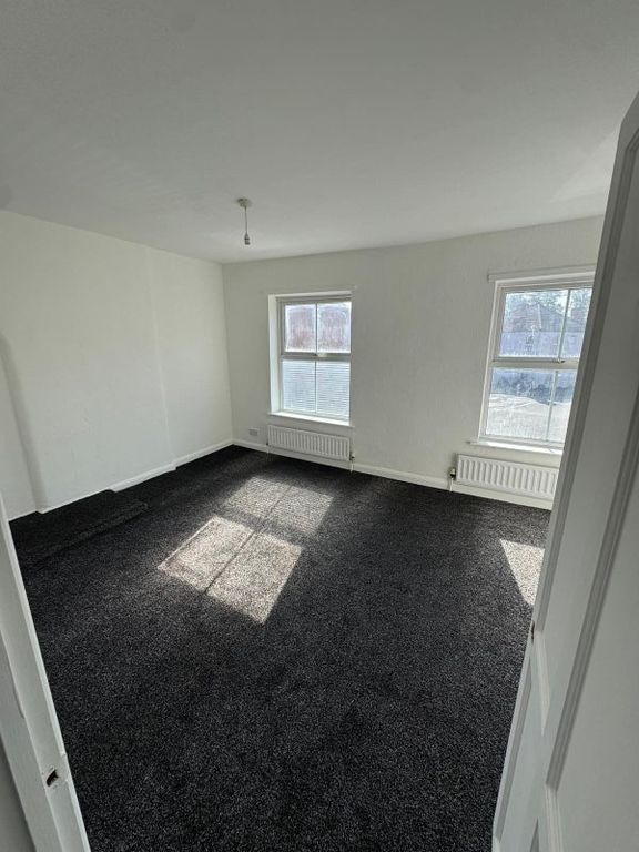 Property photo 3 of 9 Bright And Clean Double Bedroom Featuring Two Wind...