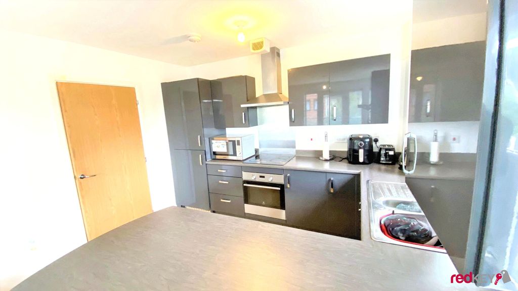 Property photo 3 of 7 Kitchen