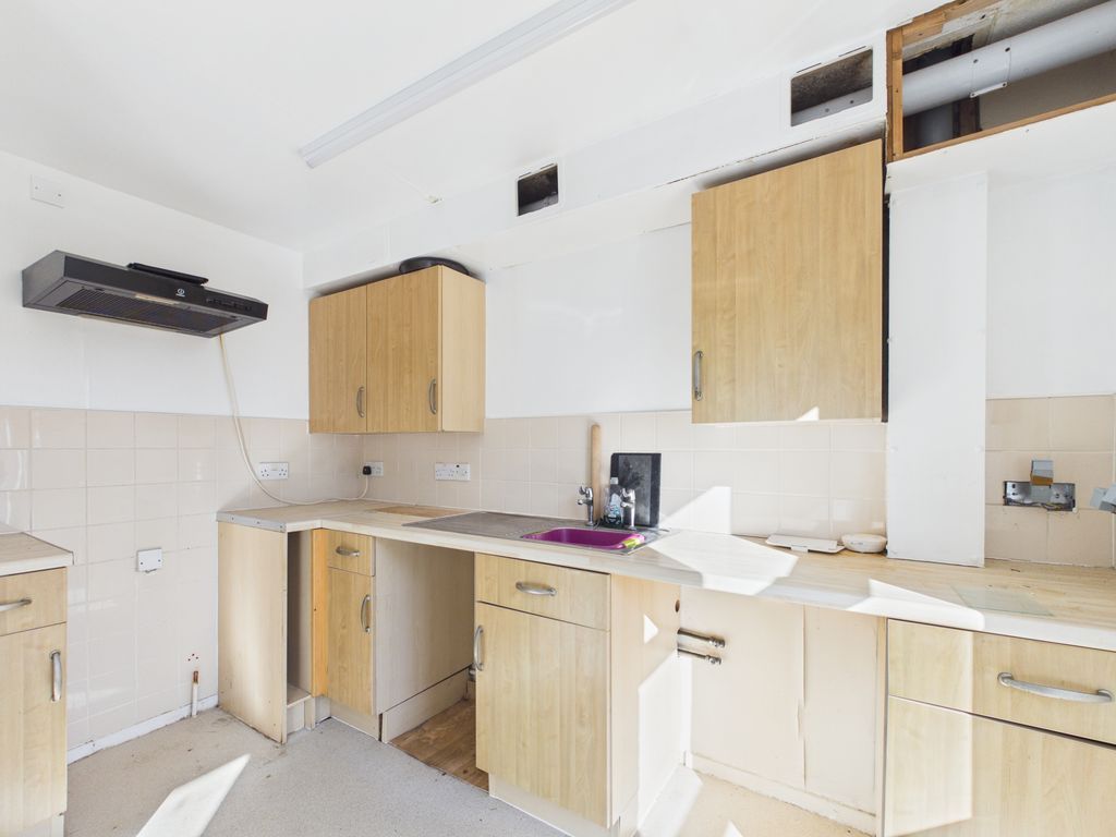 Property photo 2 of 8 Kitchen Area