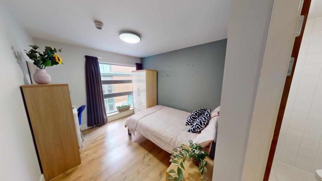 Property photo 1 of 9 A Bright And Welcoming Master Bedroom Featuring A ...