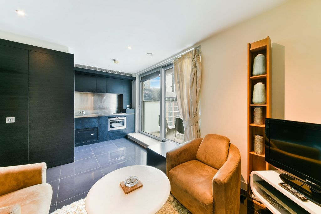 Property photo 2 of 7 Living Area