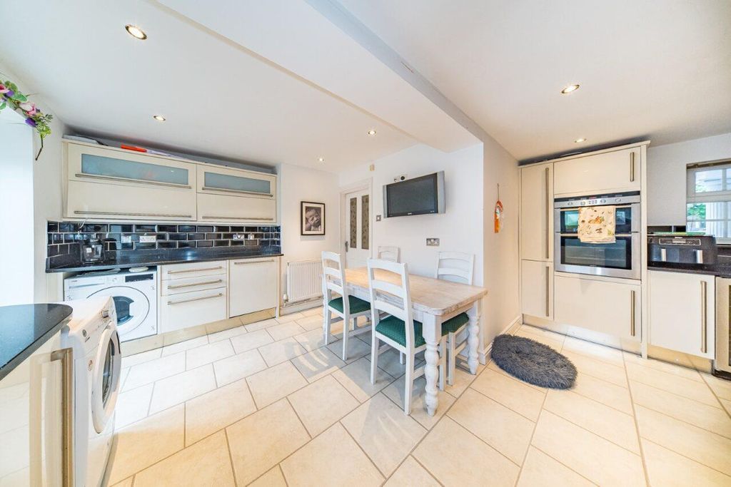 Property photo 3 of 16 53 Walpole Ave Dining Kitchen.Jpg