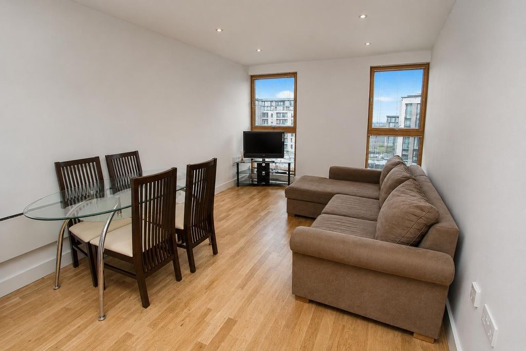 Property photo 1 of 10 Bright Living Area With Dining Set And Sofa...