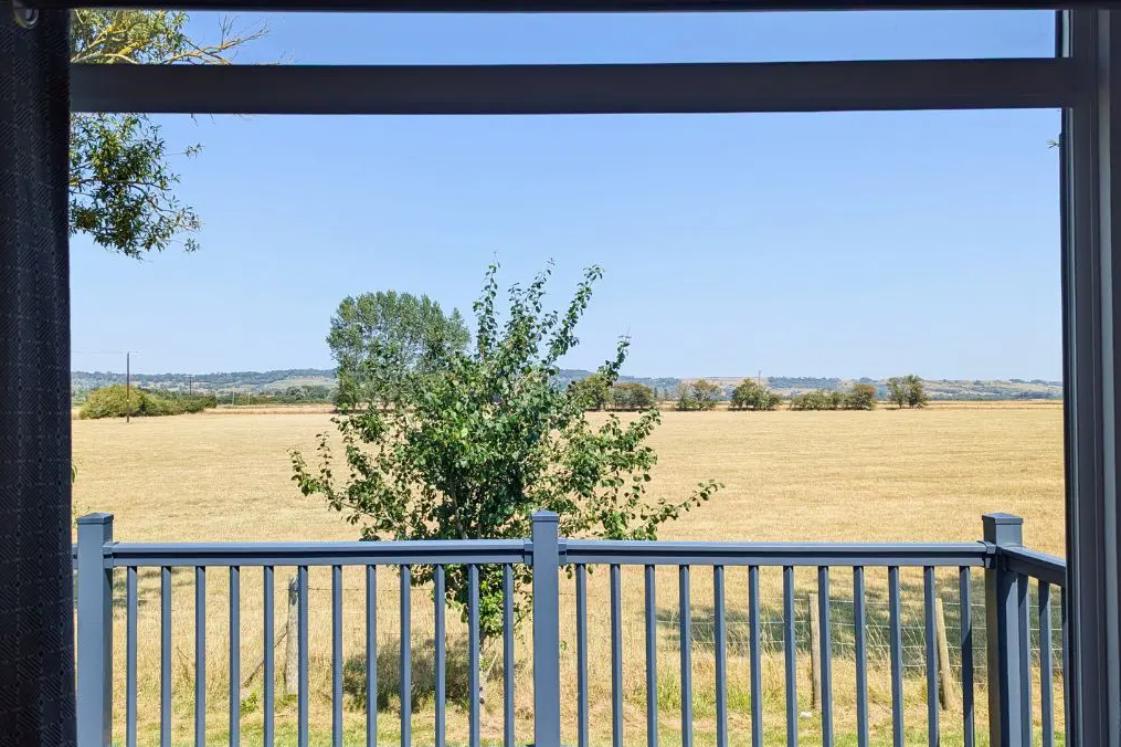 Property photo 2 of 9 Sunrise Lodge Deluxe Exterior View With Decking At Orchard Views Holiday Park Kent