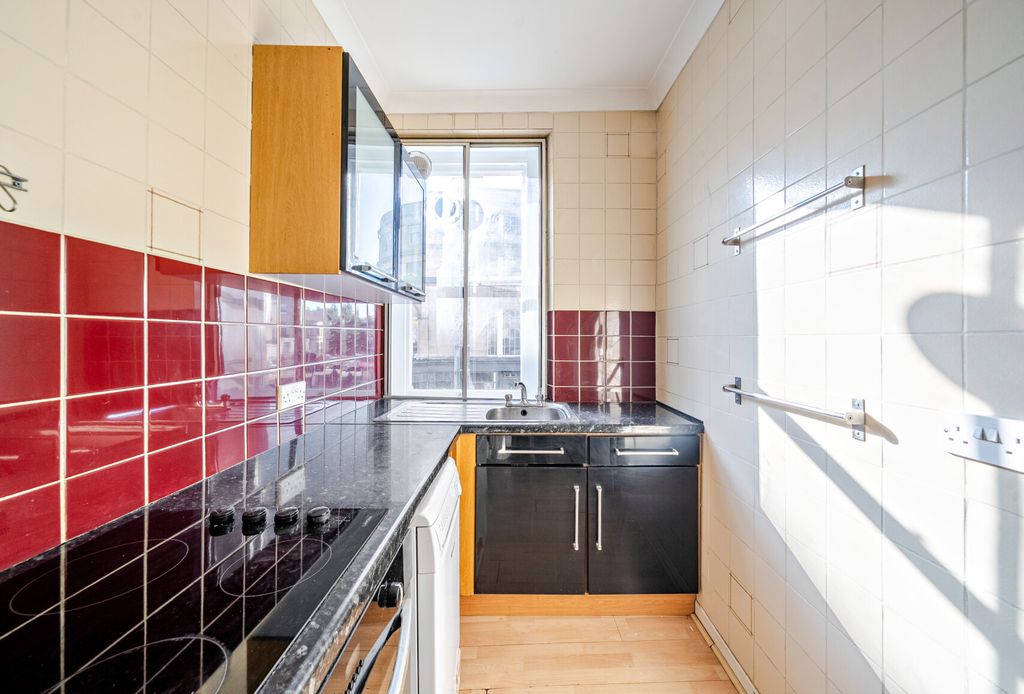 Property photo 3 of 8 Kitchen