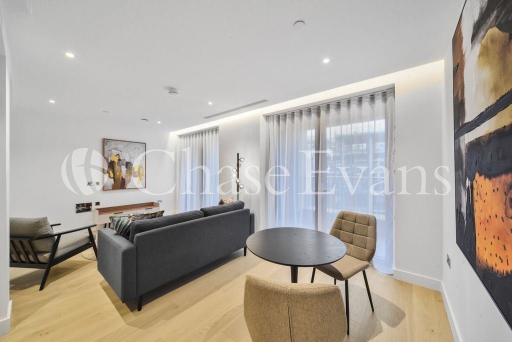Property photo 2 of 10 Living Area - Opus H