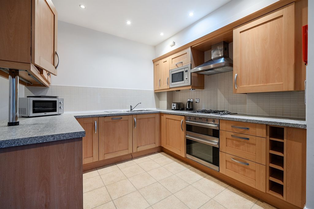 Property photo 3 of 9 Kitchen