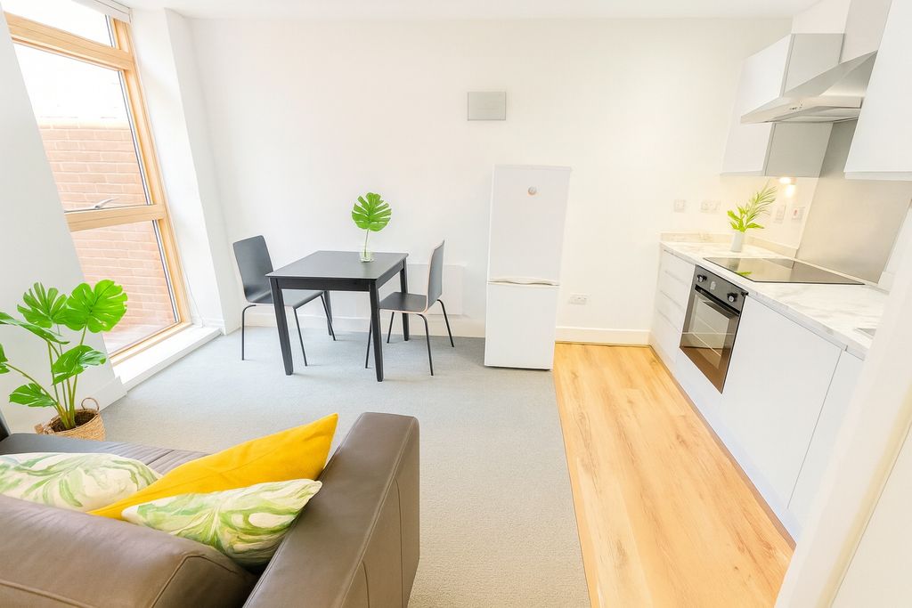 Property photo 2 of 5 Bright And Modern Living Area Featuring A Compact ...