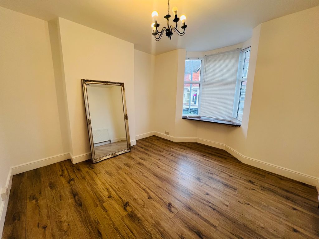 Property photo 3 of 12 Living Room