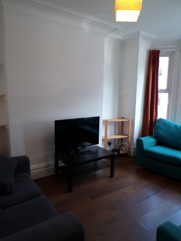 Property photo 1 of 9 A Spacious And Inviting Large Modern Living Room P...