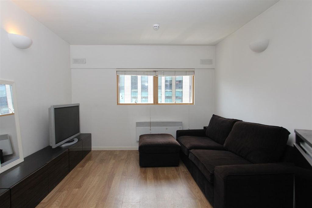 Property photo 3 of 7 Bright Lounge With Comfy Sofa And Wooden Floors...