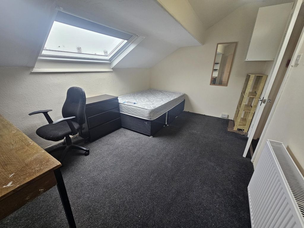 Property photo 2 of 10 A Bright And Tidy Living Room With A Large Window ...