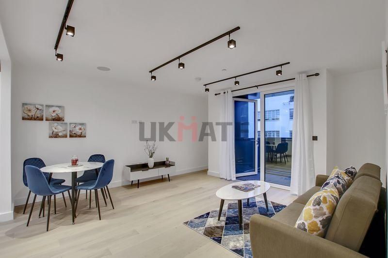 Property photo 3 of 5 Bright And Contemporary Living Room Featuring A Co...