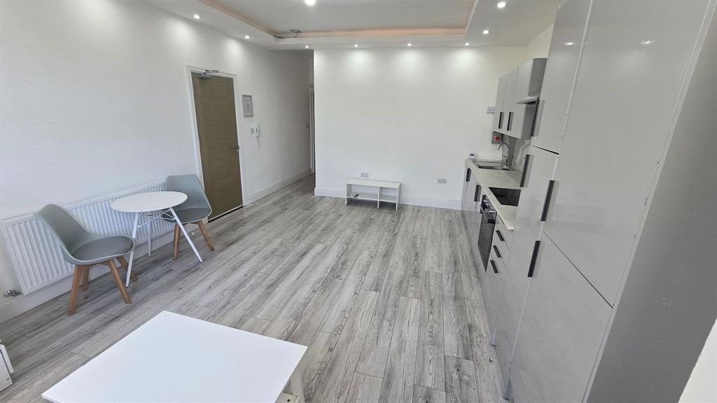 Property photo 1 of 11 A Modern, Well-Lit Living Room With Clean, Minimal...