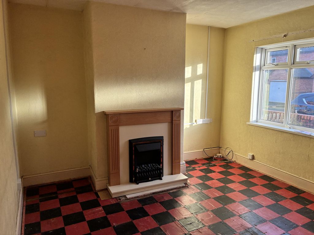 Property photo 3 of 12 Living Room 2