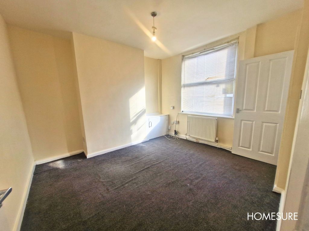 Property photo 3 of 8 Living Room