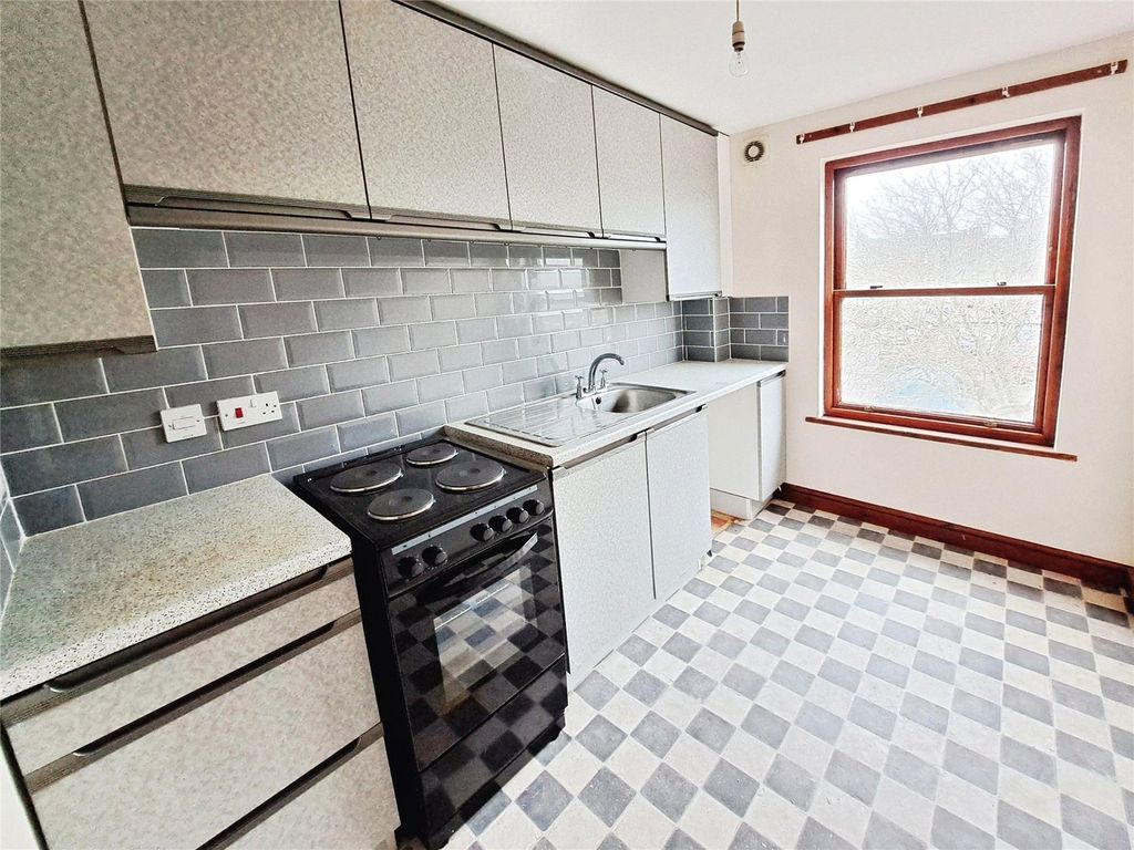 Property photo 3 of 7 Kitchen