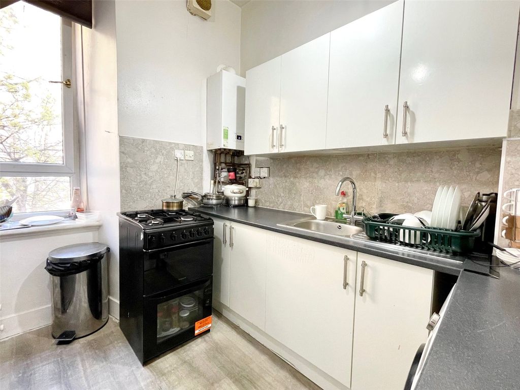Property photo 3 of 12 Kitchen