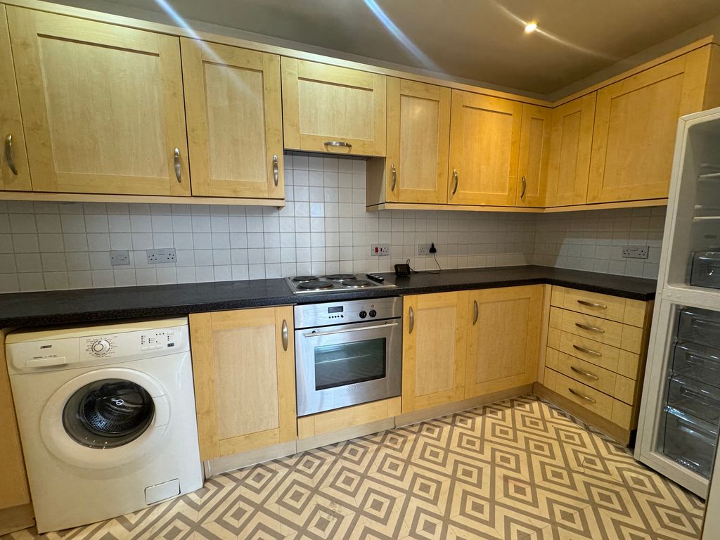 Property photo 2 of 8 Kitchen