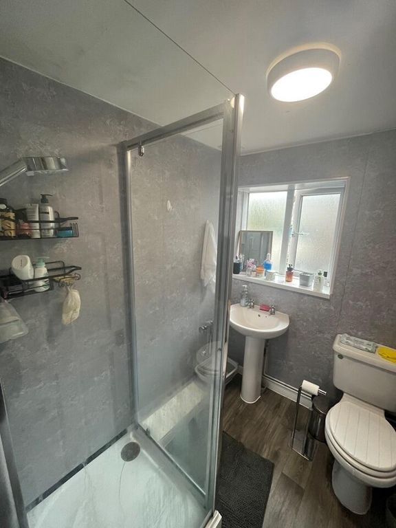 Property photo 3 of 8 A Modern Bathroom Suite Featuring A Spacious Showe...