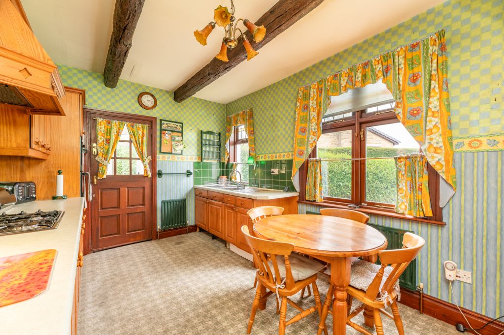 Property photo 3 of 42 Dining Kitchen