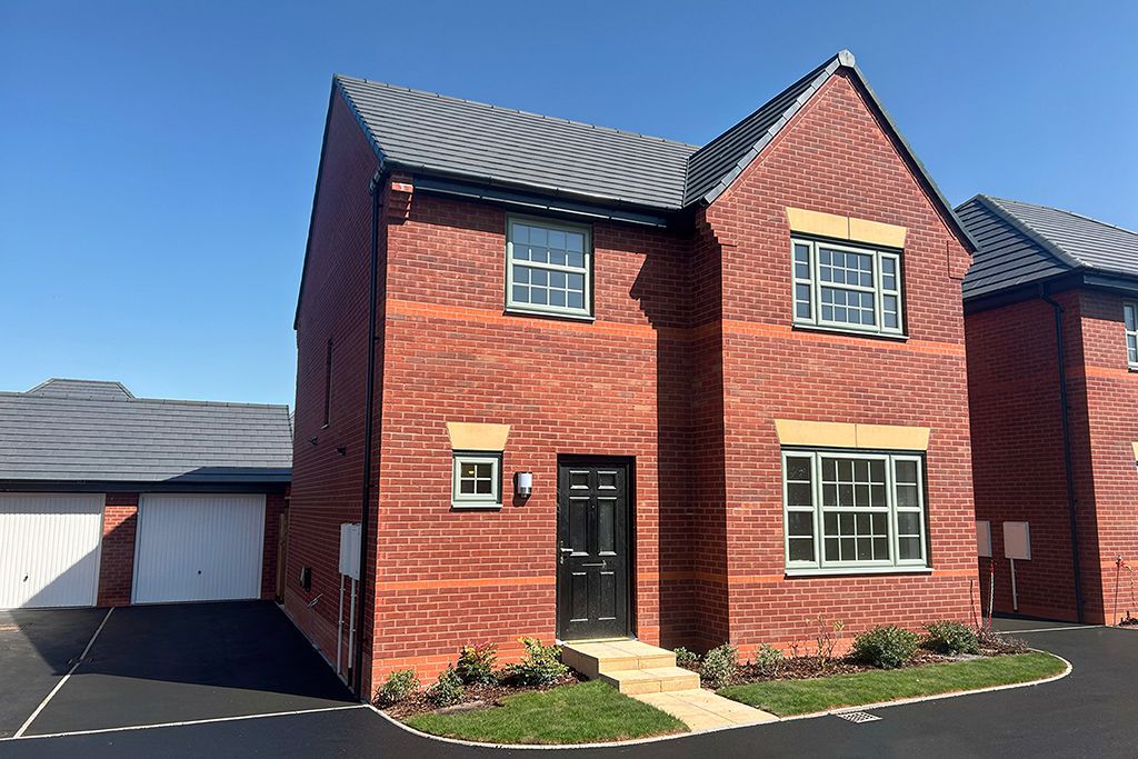 Property photo 1 of 10 A Two-Story Brick House With A Slanted Roof