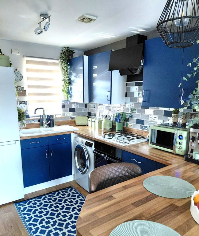 Property photo 3 of 12 Kitchen Area