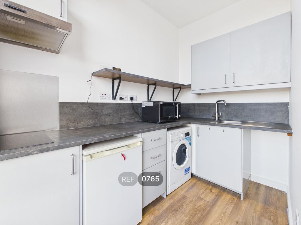 Property photo 1 of 17 Kitchen/Living Area