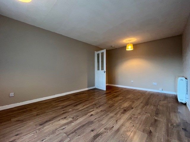 Property photo 1 of 8 Living Room