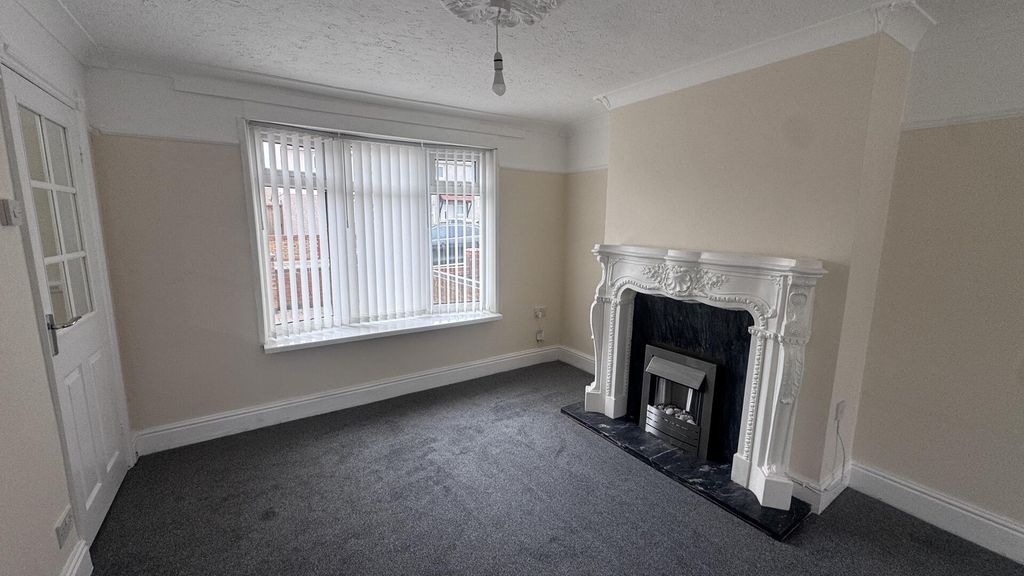 Property photo 3 of 12 Living Room