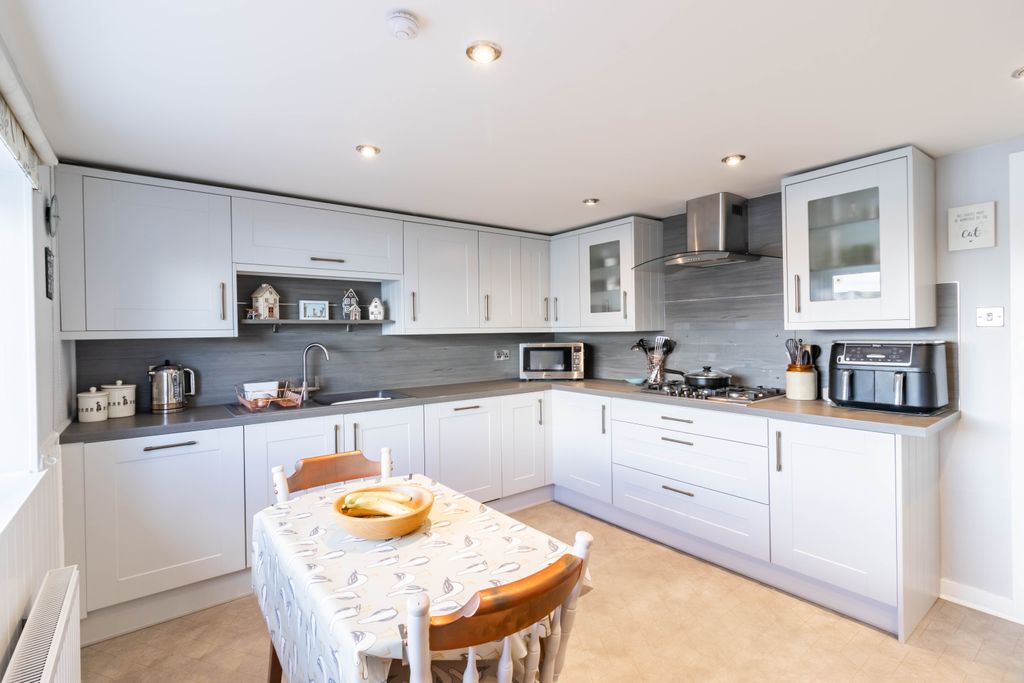 Property photo 2 of 48 Dining Kitchen