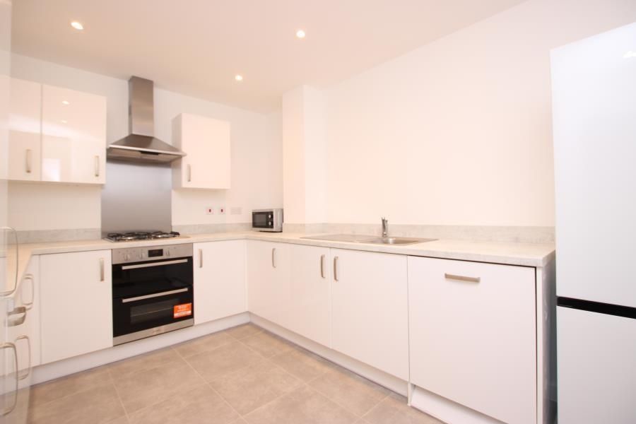 Property photo 2 of 14 Bright Modern Kitchen With White Gloss Cabinets, i...