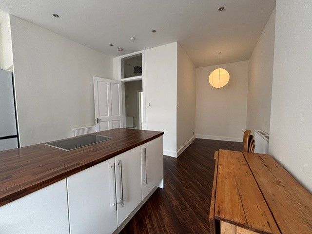 Property photo 3 of 7 Kitchen + Dining Room