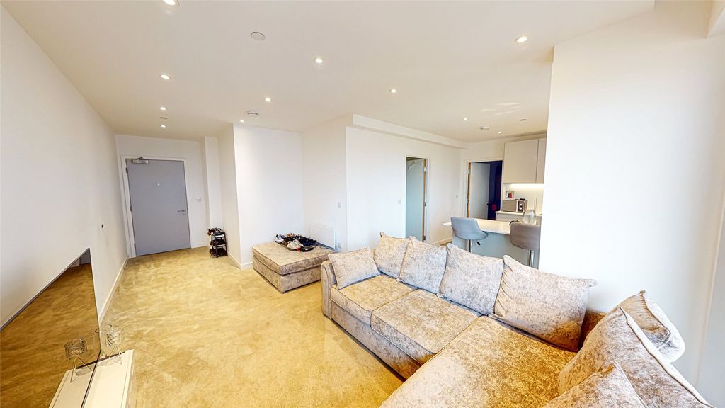 Property photo 3 of 18 Living Area