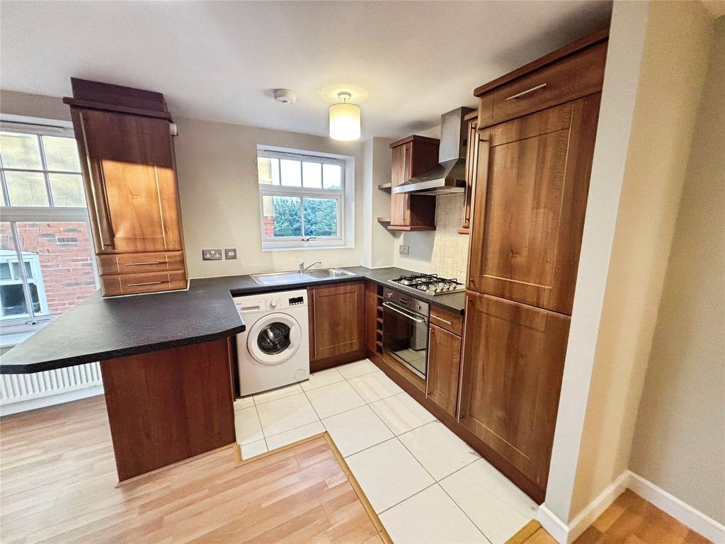 Property photo 2 of 12 Kitchen