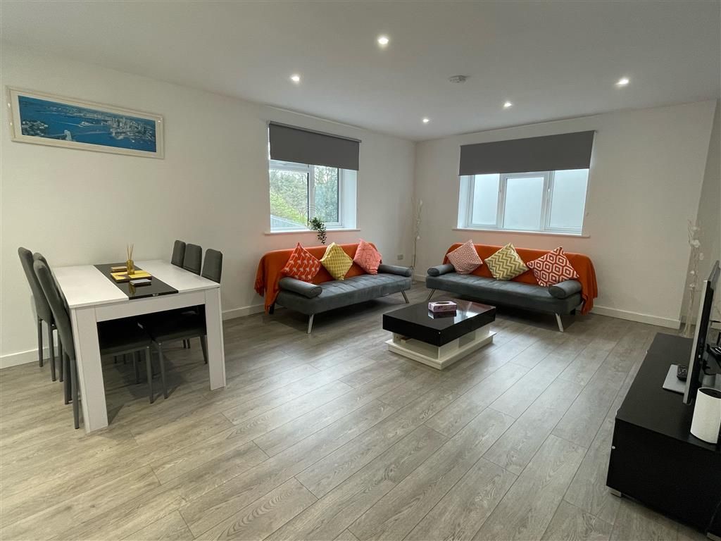 Property photo 2 of 8 Living Room