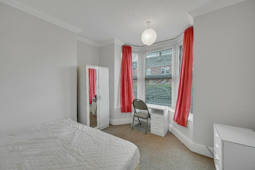 Property photo 2 of 12 A Bright Double Bedroom Featuring A Large Bay Wind...