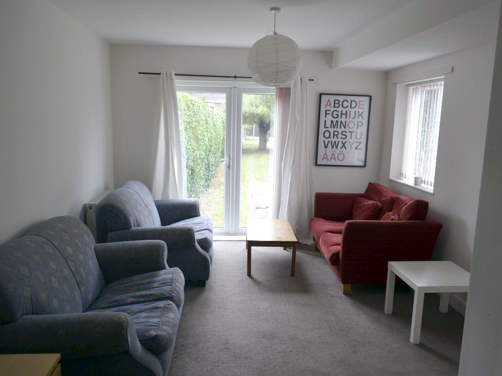 Property photo 3 of 12 Living Room 