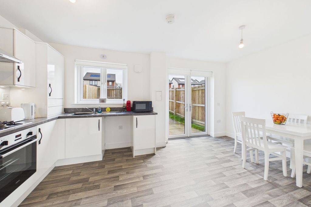 Property photo 3 of 17 Kitchen/Dining Angle 1