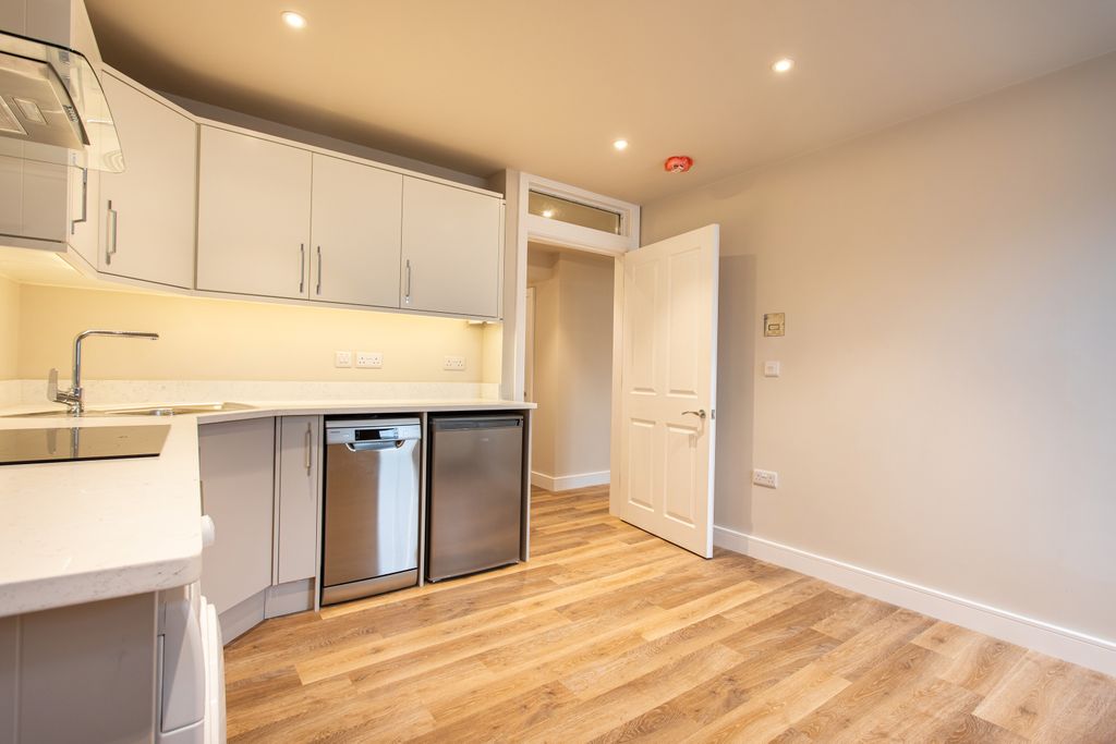 Property photo 3 of 7 Kitchen And Living Area