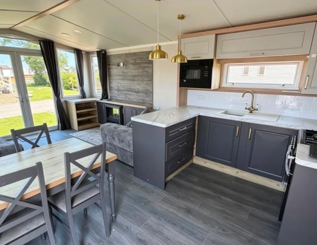 Property photo 3 of 10 Modern Kitchen And Dining Space Inside The Swift Provence Holiday Caravan