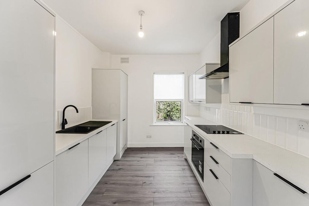 Property photo 3 of 16 Kitchen