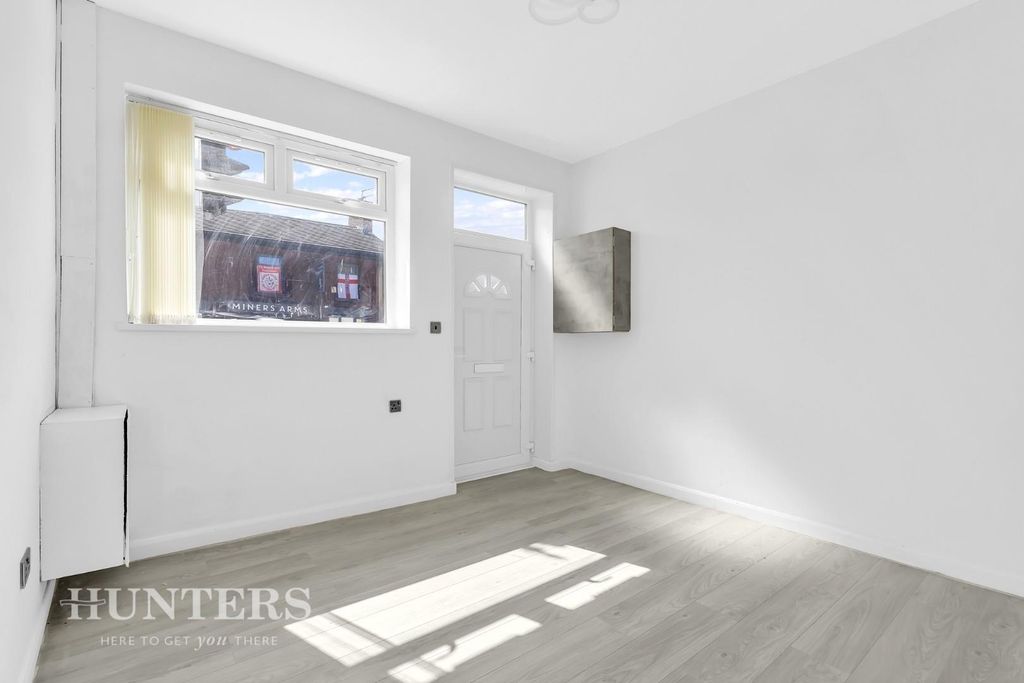 Property photo 2 of 24 126-128 Mossley Road (1).Jpg