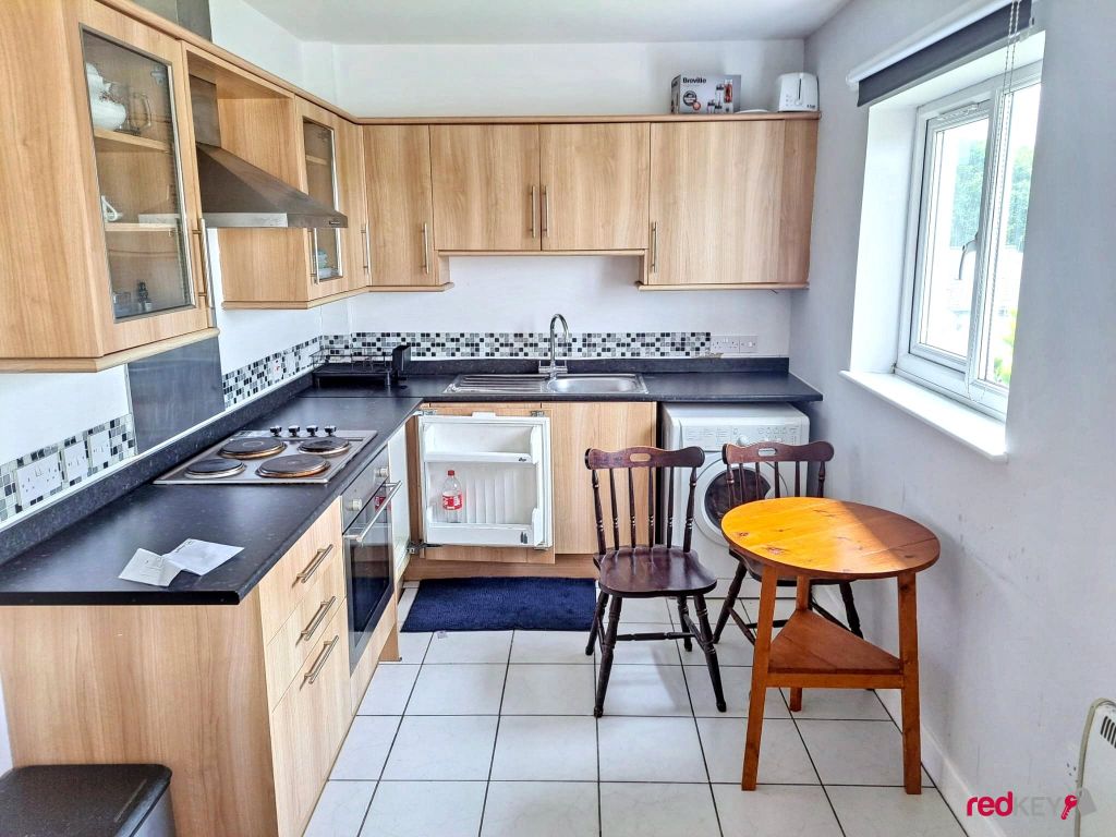 Property photo 3 of 7 Kitchen