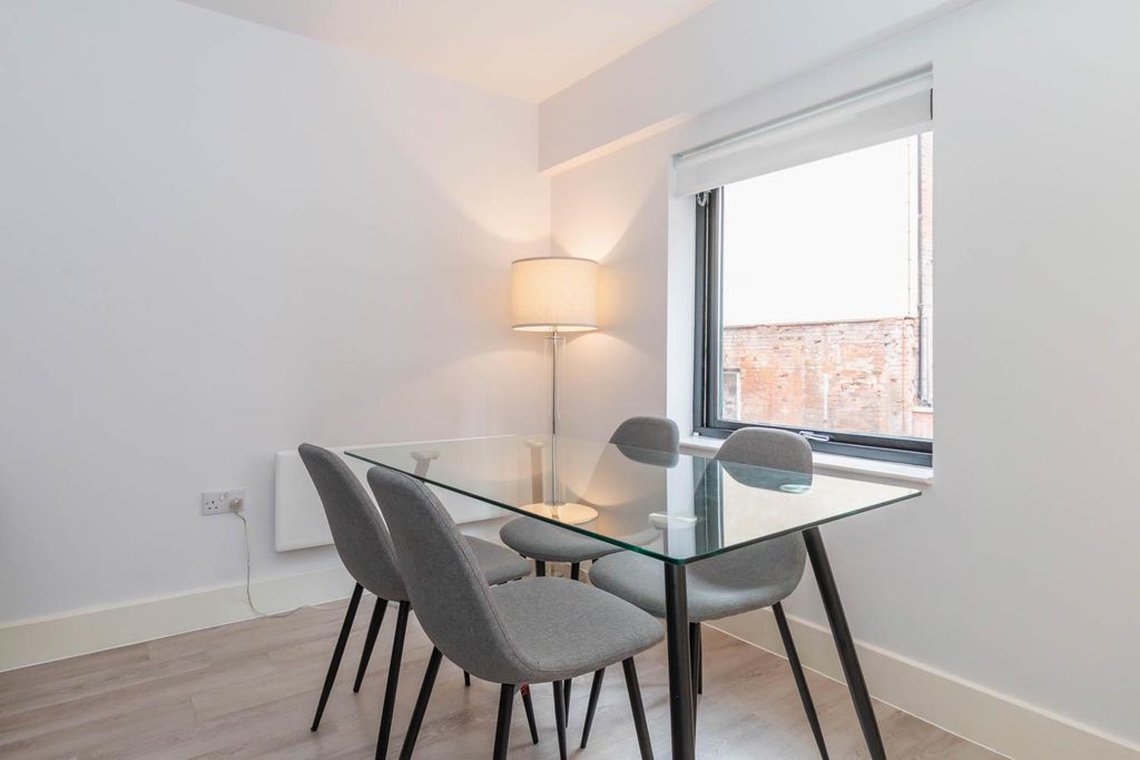 Property photo 3 of 8 Living Area / Dining Area