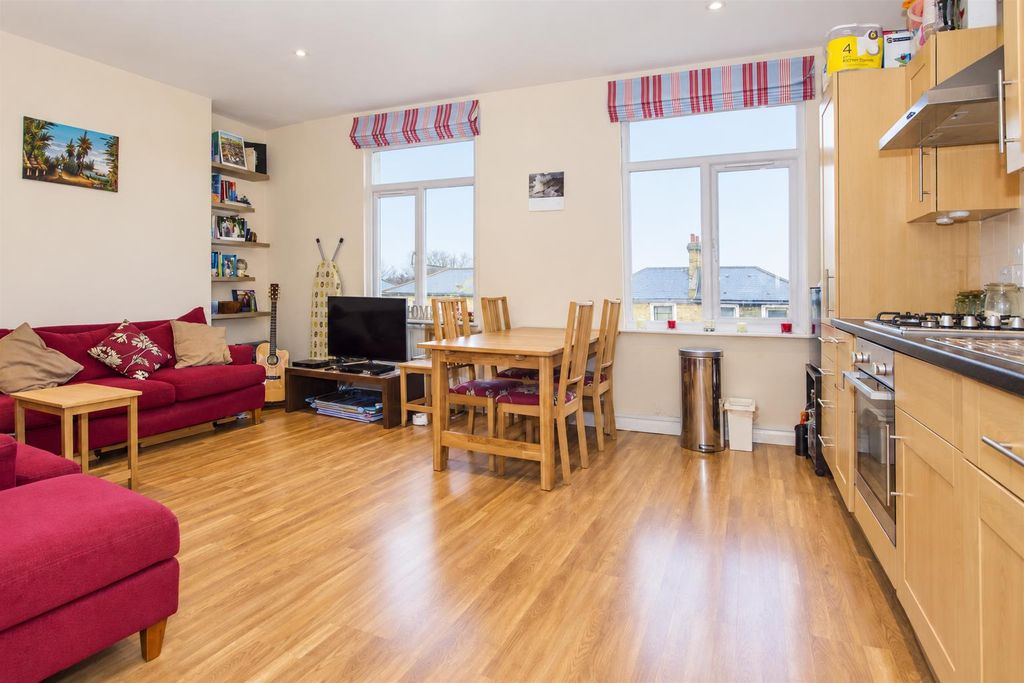 Property photo 2 of 8 Warm Open-Plan Living Space.Png