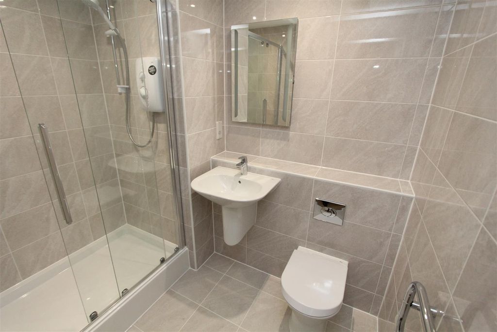 Property photo 3 of 9 Sleek Contemporary Shower Room With Stone Tiling...