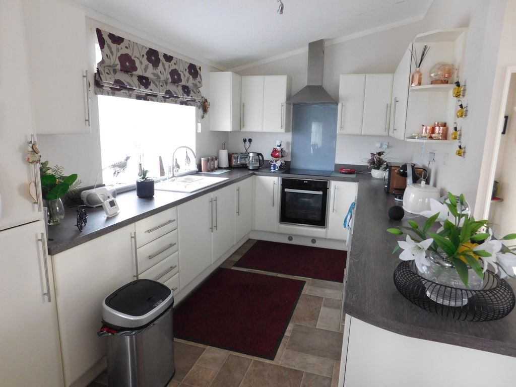 Property photo 2 of 20 Kitchen Area