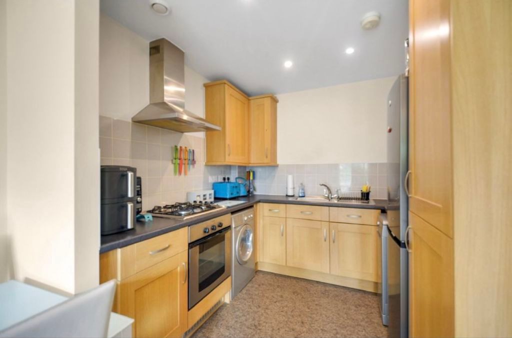Property photo 3 of 12 Kitchen